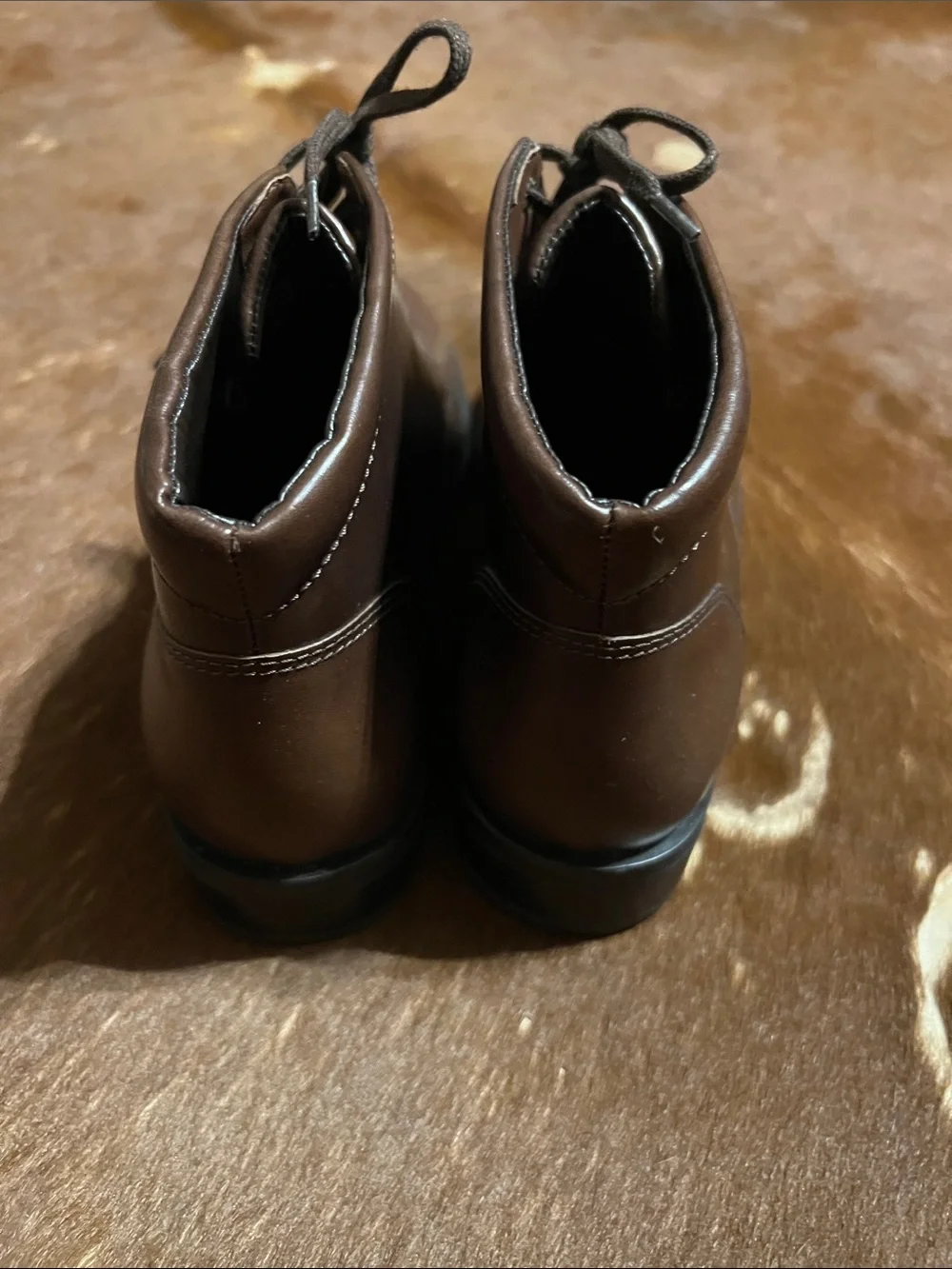 Rockport woman’s Dark Brown Leather Chukka Boots, size 7.5